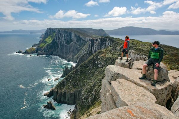 3 capes with hikers